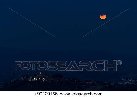 Strawberry Full Moon rise over MonteCastello di Vibio, Umbria, Italy View Large Photo Image Stock Photograph - Strawberry Full Moon rise over MonteCastello di Vibio, Umbria, Italy. Fotosearch