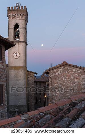 Stock Photography - Umbrian medieval street of MonteCastello di Vibio, Italy -full moon set. Fotosearch