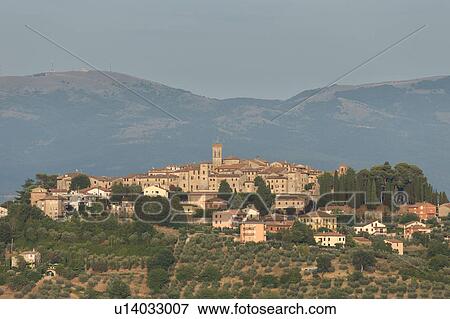 Umbrian medieval town of MonteCastello di Vibio, Italy at sunset View Large Photo Image Stock Photo - Umbrian medieval town of MonteCastello di Vibio, Italy at sunset. Fotosearch