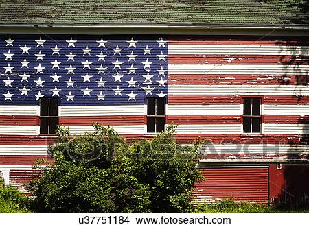 Picture - American flag painted on facade of barn. Fotosearch