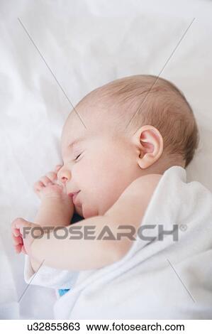 Baby girl (2-5 months) sleeping on bed View Large Photo Image Stock Image - Baby girl (2-5 months) sleeping on bed. Fotosearch