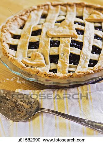 Stock Image - Baked blueberry pie. Fotosearch