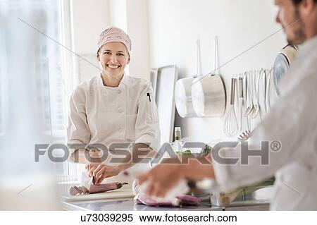 Chefs working in kitchen View Large Photo Image Stock Photography - Chefs working in kitchen. Fotosearch