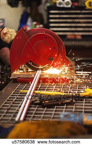 Stock Photo - Close-up of welder grinding. Fotosearch
