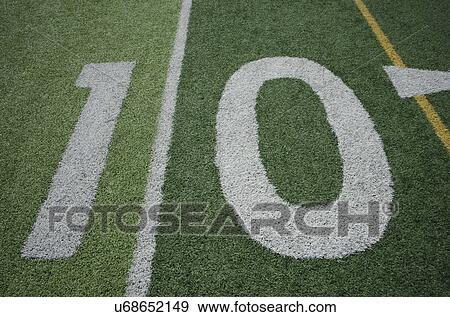Stock Photo - Football field marking of 10 yard line. Fotosearch
