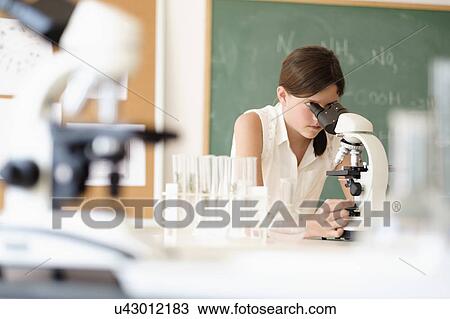 Girl (10-11) using microscope View Large Photo Image Stock Image - Girl (10-11) using microscope. Fotosearch