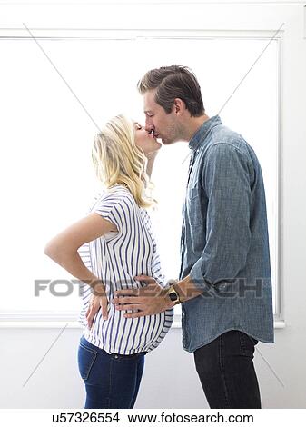 Husband with pregnant wife View Large Photo Image Picture - Husband with pregnant wife. Fotosearch