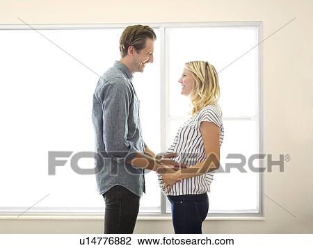 Husband with pregnant wife View Large Photo Image Stock Image - Husband with pregnant wife. Fotosearch