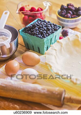 Ingredients for berry pie on table View Large Photo Image Stock Photo - Ingredients for berry pie on table. Fotosearch