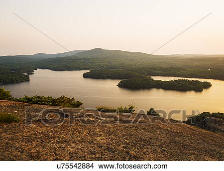 Picture - Landscape with lake at sunset. Fotosearch