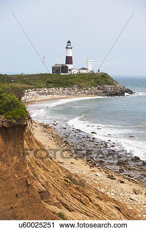 Lighthouse on cliff over sea View Large Photo Image Stock Image - Lighthouse on cliff over sea. Fotosearch
