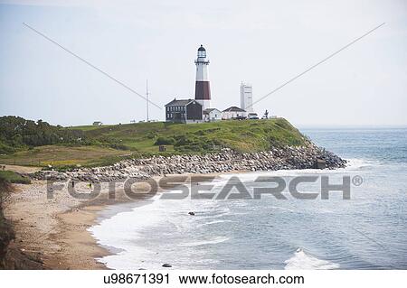 Lighthouse on cliff over sea View Large Photo Image Stock Image - Lighthouse on cliff over sea. Fotosearch