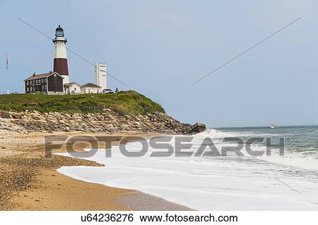 Lighthouse on cliff over sea View Large Photo Image Stock Photograph - Lighthouse on cliff over sea. Fotosearch