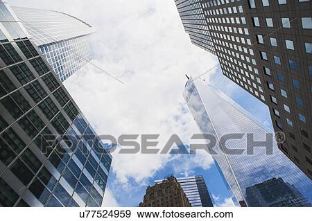 Low angle view of One World Trade Center against sky View Large Photo Image Stock Photo - Low angle view of One World Trade Center against sky. Fotosearch
