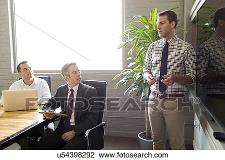 Man giving presentation View Large Photo Image Stock Image - Man giving presentation. Fotosearch