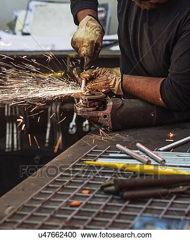 Man using circular saw in workshop View Large Photo Image Stock Image - Man using circular saw in workshop. Fotosearch