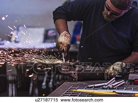 Man using circular saw in workshop View Large Photo Image Stock Photography - Man using circular saw in workshop. Fotosearch
