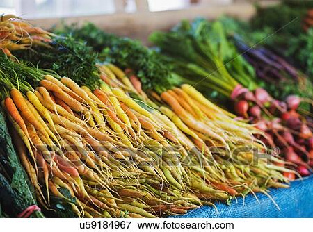Market stall with organic vegetables View Large Photo Image Stock Photo - Market stall with organic vegetables. Fotosearch