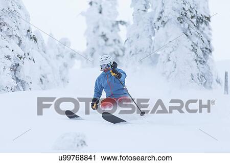 Mature man speeding on ski slope View Large Photo Image Stock Image - Mature man speeding on ski slope. Fotosearch