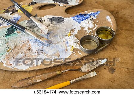 Paintbrushes and palette View Large Photo Image Picture - Paintbrushes and palette. Fotosearch