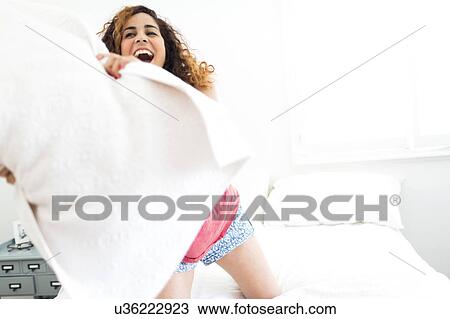 Pillow fight View Large Photo Image Stock Image - Pillow fight. Fotosearch