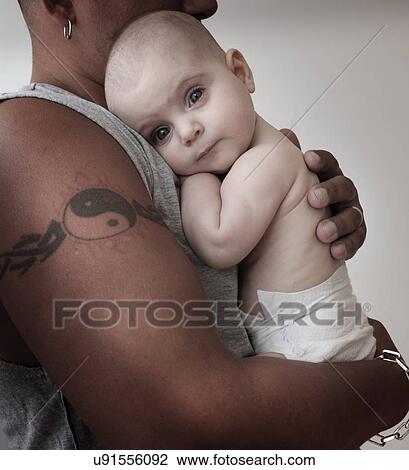 Portrait of baby girl (2-5 months) with her father View Large Photo Image Stock Image - Portrait of baby girl (2-5 months) with her father. Fotosearch