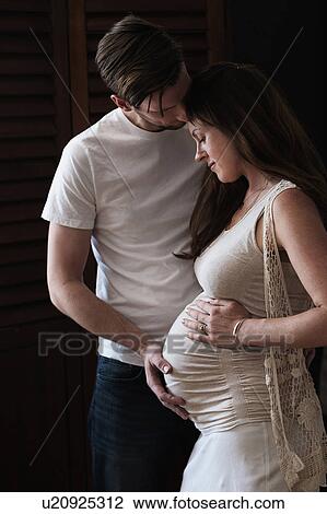 Stock Image - Portrait of content couple. Fotosearch