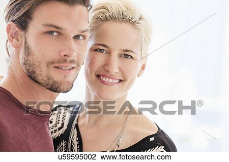 Stock Image - Portrait of couple outdoors. Fotosearch