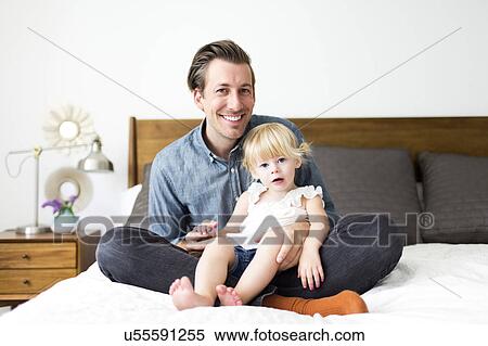 Portrait of father with daughter (2-3) in bedroom View Large Photo Image Stock Photography - Portrait of father with daughter (2-3) in bedroom. Fotosearch