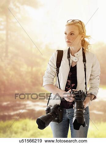 Portrait of female photographer View Large Photo Image Stock Photo - Portrait of female photographer. Fotosearch