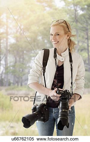 Portrait of female photographer View Large Photo Image Stock Photography - Portrait of female photographer. Fotosearch