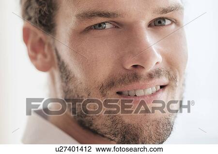 Stock Image - Portrait of mid-adult man. Fotosearch