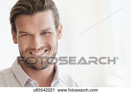 Stock Image - Portrait of mid-adult man. Fotosearch
