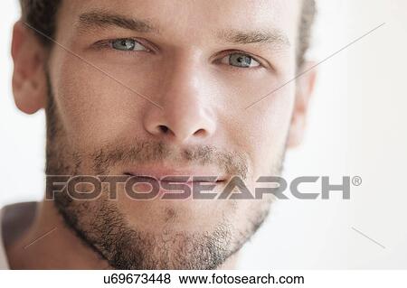 Stock Photo - Portrait of mid-adult man. Fotosearch