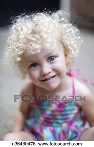 Portrait of smiley blonde girl (4-5) View Large Photo Image Stock Photograph - Portrait of smiley blonde girl (4-5). Fotosearch