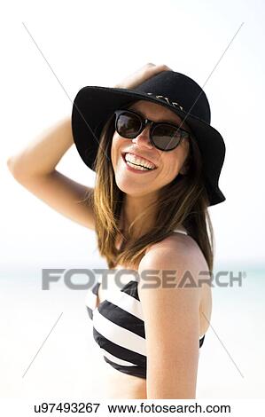 Portrait of woman on beach View Large Photo Image Stock Photo - Portrait of woman on beach. Fotosearch