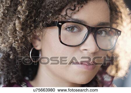 Portrait of woman with curly hair View Large Photo Image Stock Image - Portrait of woman with curly hair. Fotosearch