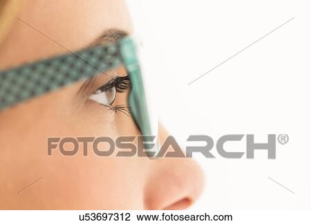 Portrait of young woman in studio View Large Photo Image Stock Image - Portrait of young woman in studio. Fotosearch