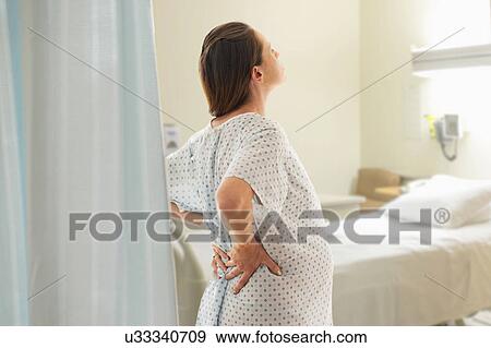 Pregnant woman at hospital View Large Photo Image Stock Photo - Pregnant woman at hospital. Fotosearch