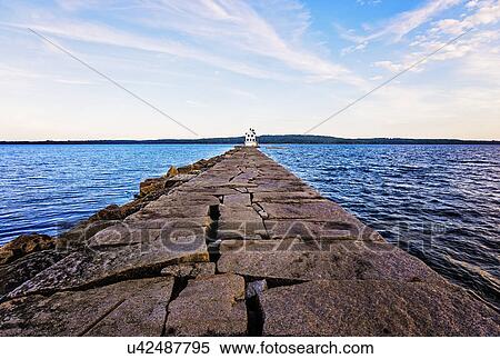 Stock Photography - Rockland Breakwater Lighthouse seeing from pier. Fotosearch