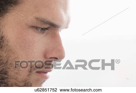 Side-view of pensive businessman View Large Photo Image Stock Image - Side-view of pensive businessman. Fotosearch