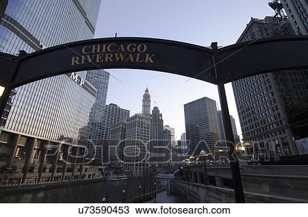 Stock Image - Sign on Chicago Riverwalk against sky. Fotosearch