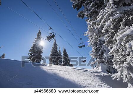 Ski lift over ski slope View Large Photo Image Stock Image - Ski lift over ski slope. Fotosearch
