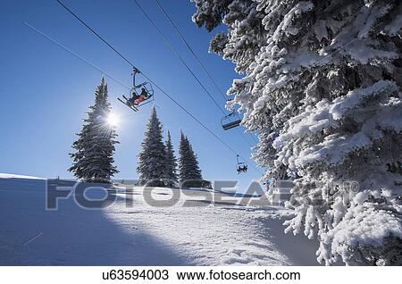 Ski lift over ski slope View Large Photo Image Stock Image - Ski lift over ski slope. Fotosearch