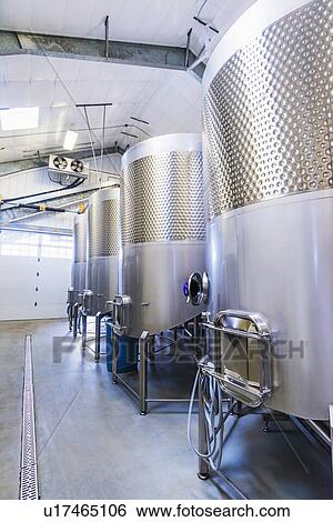 Stainless steel tanks in winery cellar View Large Photo Image Stock Photograph - Stainless steel tanks in winery cellar. Fotosearch