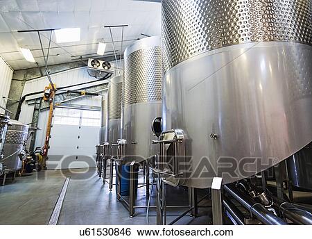 Stainless steel tanks in winery cellar View Large Photo Image Stock Photograph - Stainless steel tanks in winery cellar. Fotosearch