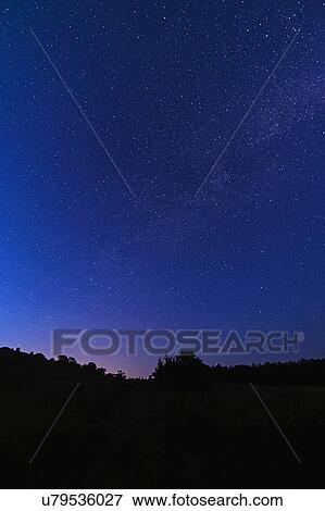 Stock Photo - Starry sky at night. Fotosearch