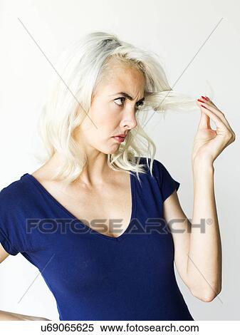 Stock Photography - Studio shot of beautiful woman. Fotosearch