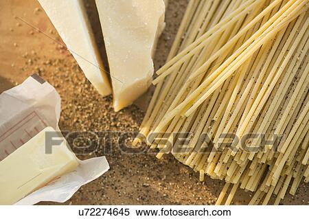 Stock Photography - Studio shot of cheese pasta and butter. Fotosearch