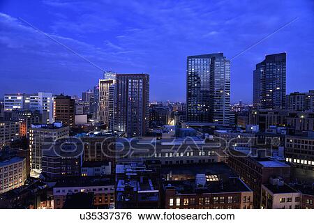 View of Downtown District at dusk View Large Photo Image Stock Photograph - View of Downtown District at dusk. Fotosearch